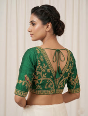 Luxury Emerald Green raw silk Saree Blouse with Gold Peacock and Floral Zari Embroidery – V-Neck Backless Design with Latkan Tassels