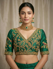 Luxury Emerald Green raw silk Saree Blouse with Gold Peacock and Floral Zari Embroidery – V-Neck Backless Design with Latkan Tassels