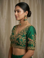 Luxury Emerald Green raw silk Saree Blouse with Gold Peacock and Floral Zari Embroidery – V-Neck Backless Design with Latkan Tassels